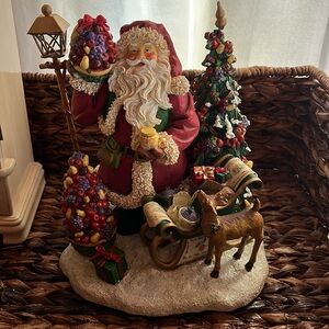 Festive Santa Claus Figurine with Reindeer